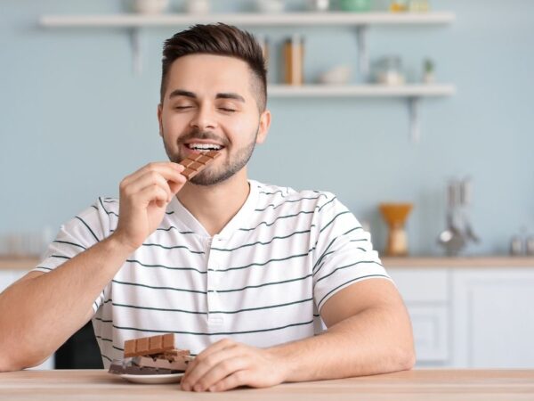 Man snacking on sugary food